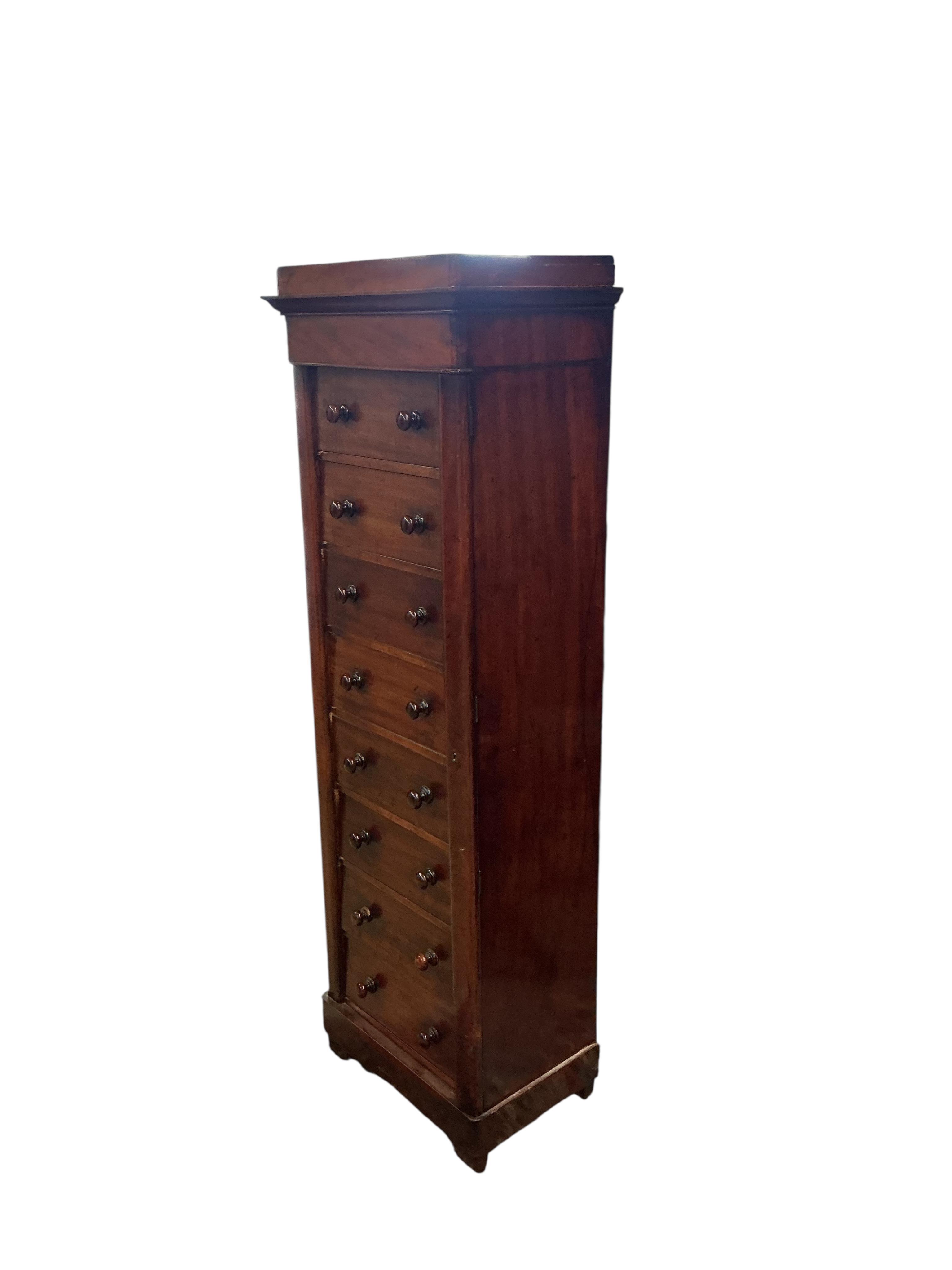 A Victorian mahogany Wellington chest, width 53cm, depth 35cm, height 158cm
